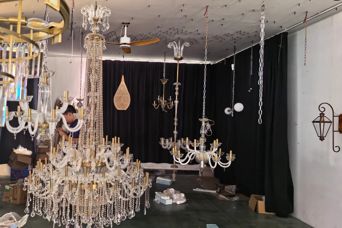Large custom crystal chandelier assembled for workshop pre-installation