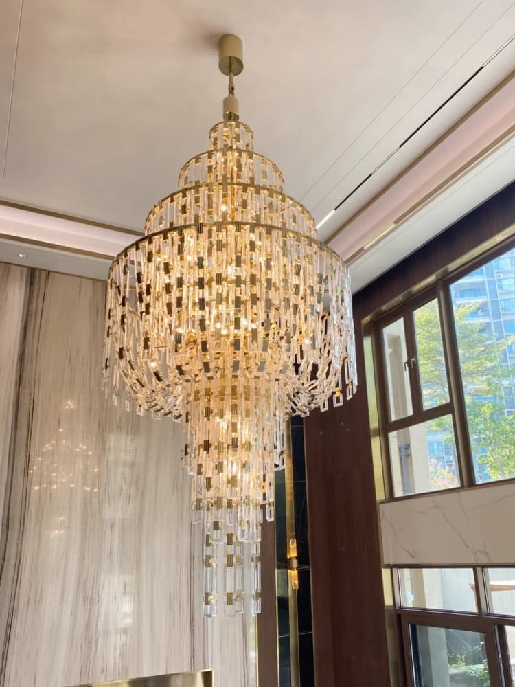 Installed fixture overall for the tiered crystal chandelier private foyer