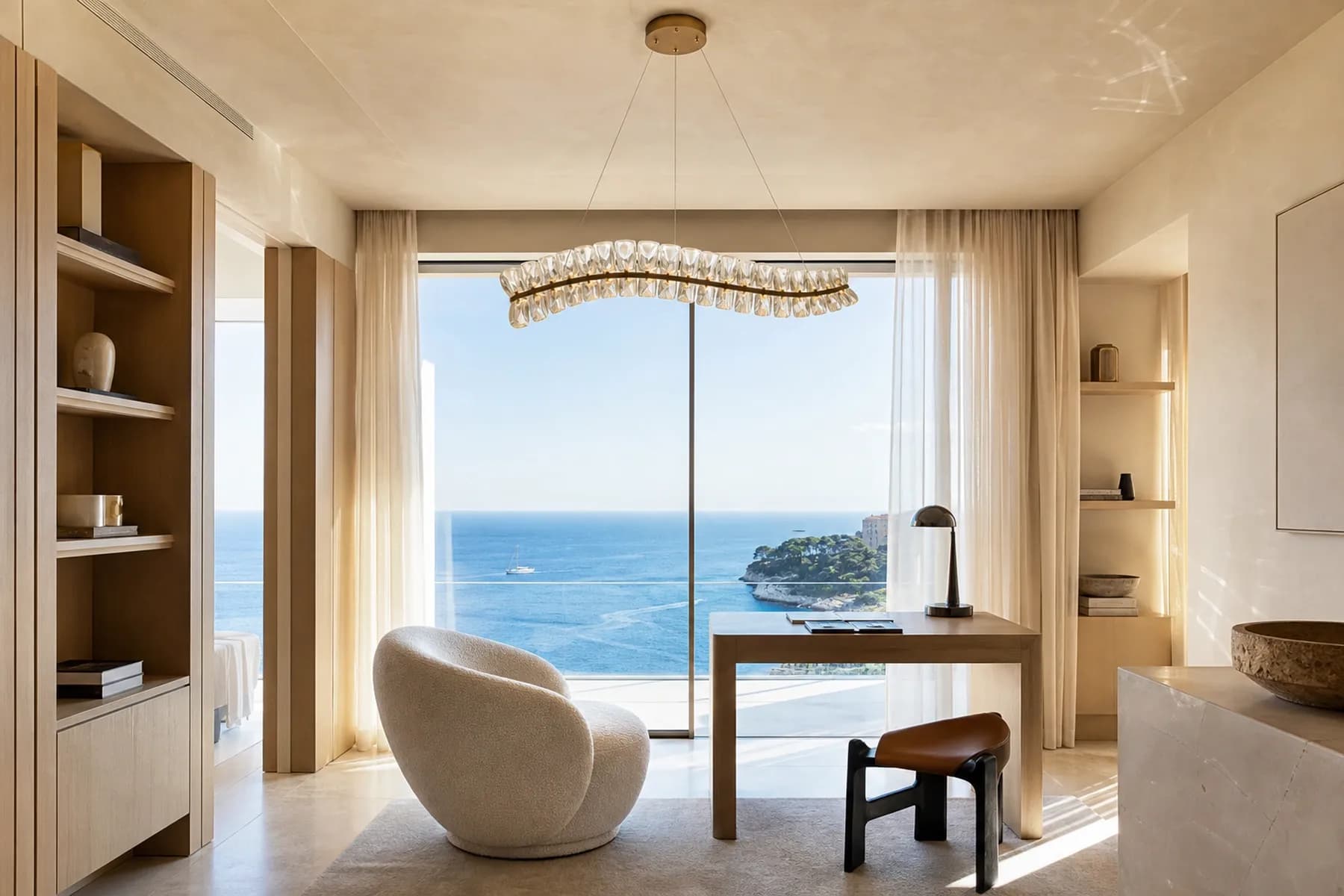 Monaco private study with a compact crystal ribbon chandelier and sea view