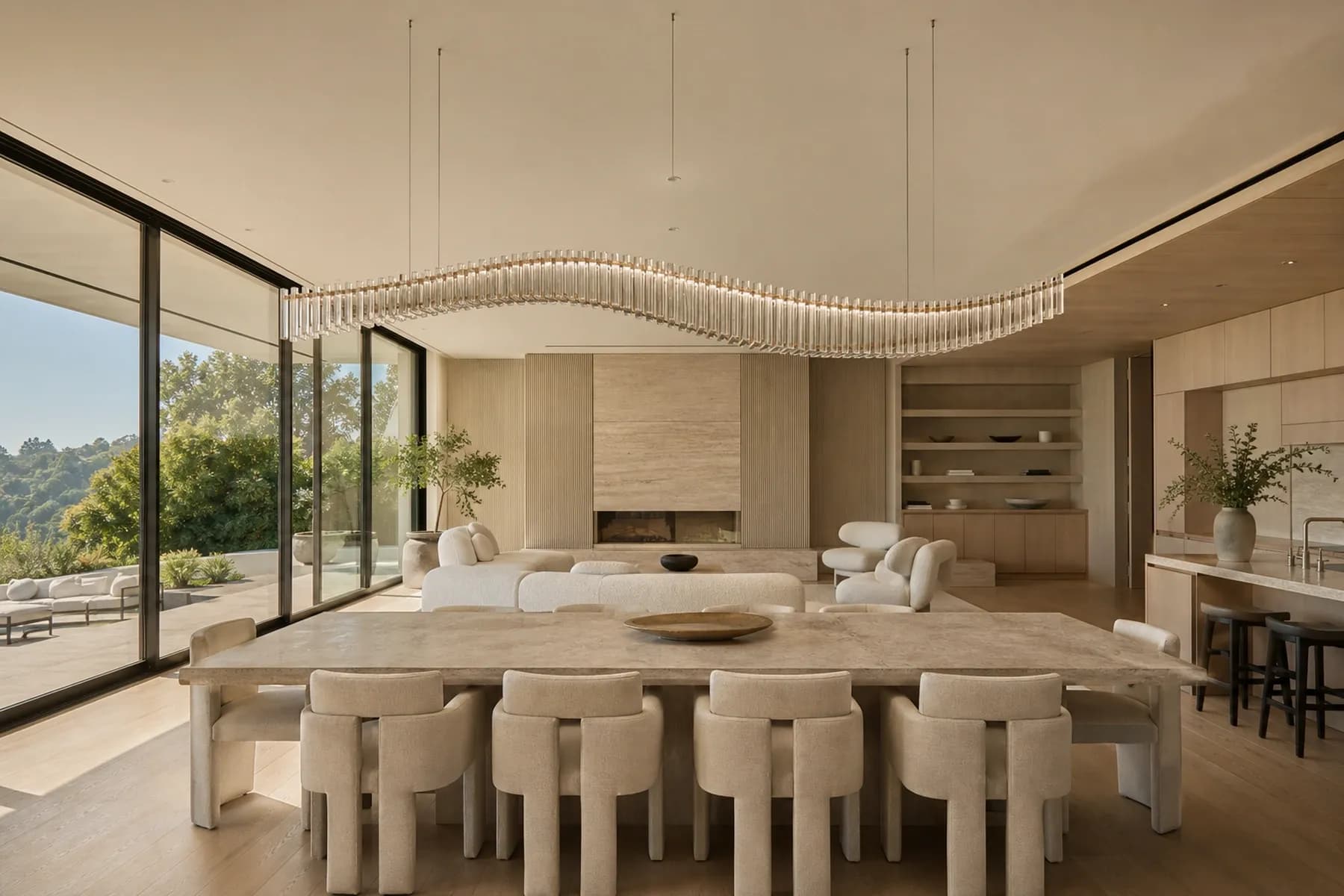 Open-plan Los Angeles villa with a long wave chandelier of clear crystal fins
